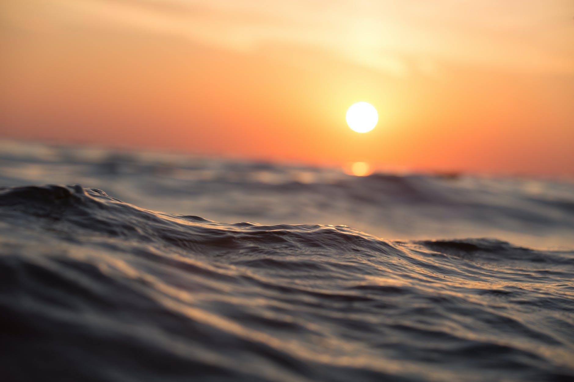 body of water during golden hour